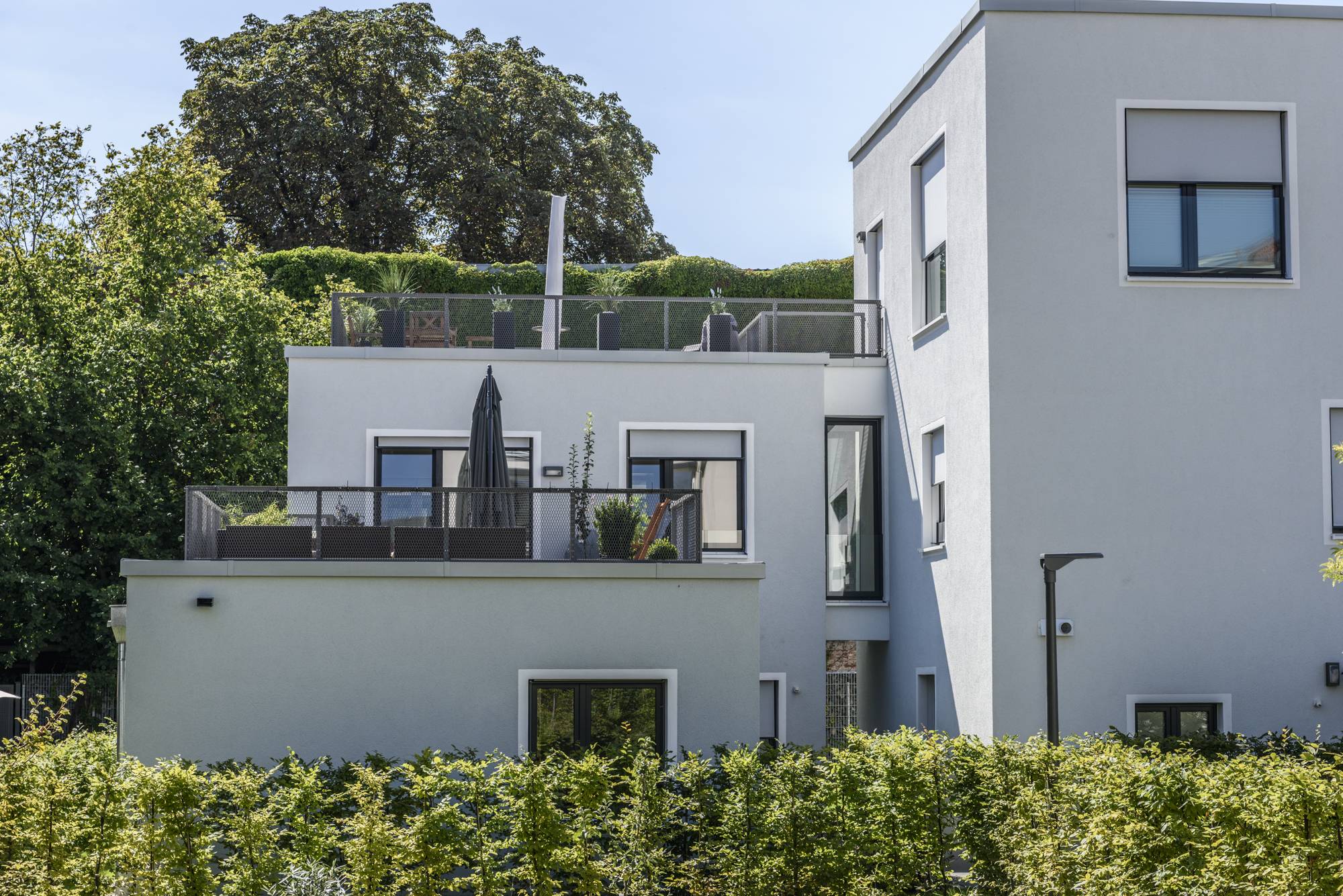 8. Foto San VI_ADRESSE_RBF_Wohnbau_Cube-Haeuser_DSC7742